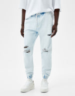 Load image into Gallery viewer, Ripped jogger jeans
